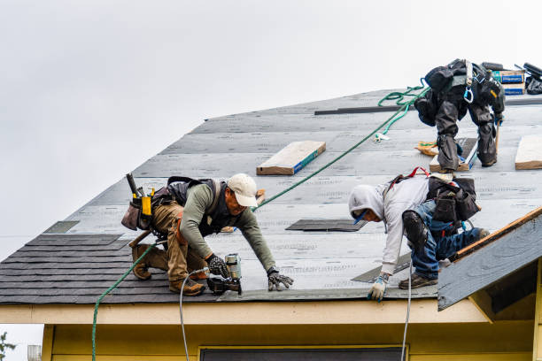 Professional Gutter Installation technician working in Merrick, NY